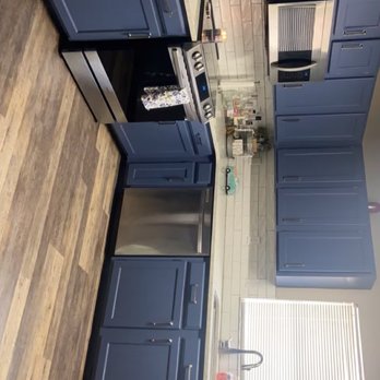 Twisted Oak Construction INC - Painted cabinet with new countertops and appliances - General Contractors Near Me - St. Cloud, Florida Twisted Oak Construction INC - Painted cabinet with new countertops and appliances - General Contractors Near Me - St. Cloud, Florida