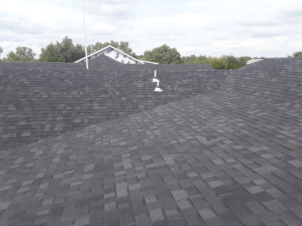 Slide of Riley-Sons Roofing and Construction