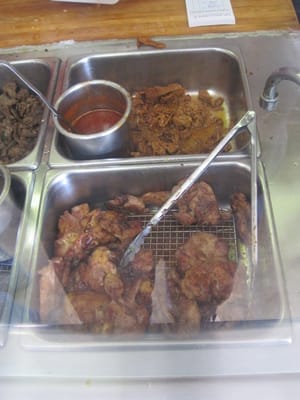 Photo of HRD - San Francisco, CA, US. BBQ chicken in the front, spicy Korean pork in the back