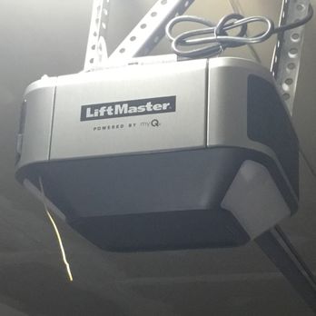 Next Door - Whisper quiet belt-drive motor. The car engine sound inside the garage is louder than this opener operating - Garage Door Services Near Me - South Elgin, Illinois