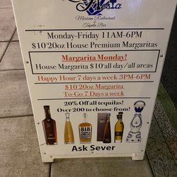La Fiesta Mexican Kitchen & Tequila Bar - Advertisement highlights to go margaritas. When you request this, they bait you by highlighting you have to buy food. False advertising