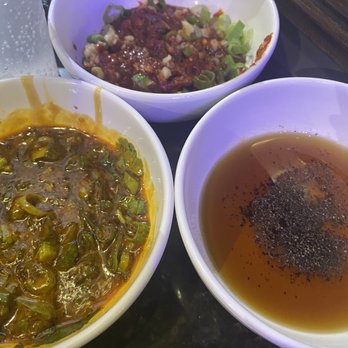Hot Pot Korean BBQ - The holy trinity of sauces- peanut based hot pot sauce, gochujang with garlic and green onions, and sesame oil with salt and pepper - Korean Near Me - Jacksonville, Florida