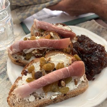 Café Amelie - Toast with fig jam and prosciutto - Breakfast & Brunch Near Me - New Orleans, Louisiana Café Amelie - Toast with fig jam and prosciutto - Breakfast & Brunch Near Me - New Orleans, Louisiana