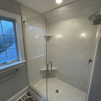Berwyn Kitchen and bath showroom - White shower remodel with beautiful glass door - General Contractors Near Me - Berwyn, Pennsylvania Berwyn Kitchen and bath showroom - White shower remodel with beautiful glass door - General Contractors Near Me - Berwyn, Pennsylvania