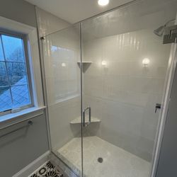 Berwyn Kitchen and bath showroom - White shower remodel with beautiful glass door