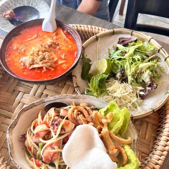 Nok’s Kitchen - papaya salad with octopus and curry chicken - Laotian Near Me - Westminster, California Nok’s Kitchen - papaya salad with octopus and curry chicken - Laotian Near Me - Westminster, California