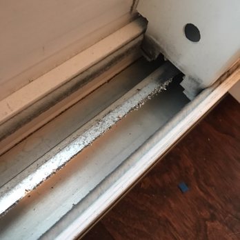 Power Home Remodeling - Metal shavings on my sliding glass door track. This product is junk! - Windows Installation Near Me - Duluth, Georgia Power Home Remodeling - Metal shavings on my sliding glass door track. This product is junk! - Windows Installation Near Me - Duluth, Georgia