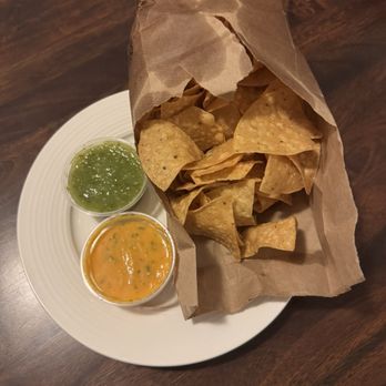 Lonesome Rose - Andersonville - Chips and Salsa (Tomatillo Crudo & Pineapple Habanero) - Tex-Mex Near Me - Chicago, Illinois Lonesome Rose - Andersonville - Chips and Salsa (Tomatillo Crudo & Pineapple Habanero) - Tex-Mex Near Me - Chicago, Illinois
