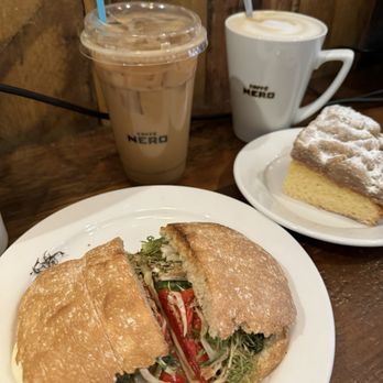 Caffè Nero - Turkey Caprese Ciabatta Iced vanilla Iced Latte (20oz) Butter Crumb Cake - Coffee & Tea Near Me - Winchester, Massachusetts Caffè Nero - Turkey Caprese Ciabatta Iced vanilla Iced Latte (20oz) Butter Crumb Cake - Coffee & Tea Near Me - Winchester, Massachusetts