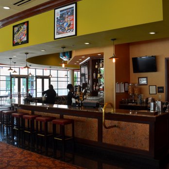 Rocky River Grille - Circular Bar in the middle - New American Near Me - Concord, North Carolina Rocky River Grille - Circular Bar in the middle - New American Near Me - Concord, North Carolina