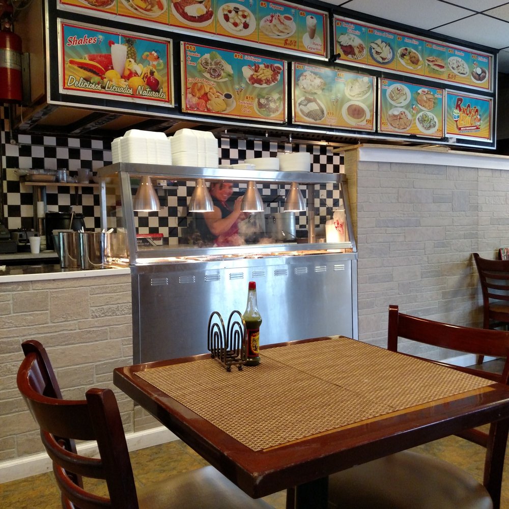 Rinconcito Latino - a table and chairs in a restaurant - Bakeries Near Me - Trenton, New Jersey Rinconcito Latino - a table and chairs in a restaurant - Bakeries Near Me - Trenton, New Jersey