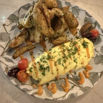 The Greek Bar - Aegean Omelette with Crispy Potatoes - Cocktail Bars Near Me - Austin, Texas The Greek Bar - Aegean Omelette with Crispy Potatoes - Cocktail Bars Near Me - Austin, Texas
