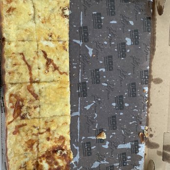 Ledo Pizza - Removed half to show how greasy it is... - Pizza Near Me - Wilmington, North Carolina Ledo Pizza - Removed half to show how greasy it is... - Pizza Near Me - Wilmington, North Carolina