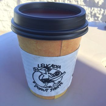Leucadia Donut Shoppe - Cute cartoon on the Leucadia donut coffee sleeve - Donuts Near Me - Encinitas, California Leucadia Donut Shoppe - Cute cartoon on the Leucadia donut coffee sleeve - Donuts Near Me - Encinitas, California