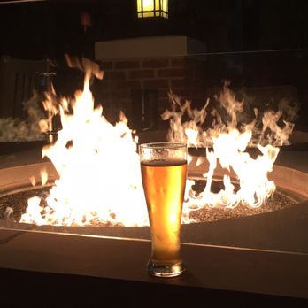 110 Grill - Notch Brewing Session Pils by the fire. - New American Near Me - Braintree, Massachusetts