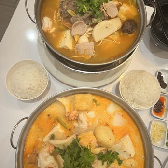 Thai Hot Pot - Tom yum (top) and Tom kha (bottom) - Thai Near Me - Gardena, California Thai Hot Pot - Tom yum (top) and Tom kha (bottom) - Thai Near Me - Gardena, California