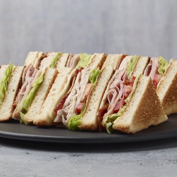 Paisano's Pizza - a club sandwich on a plate - Pizza Near Me - Alexandria, Virginia