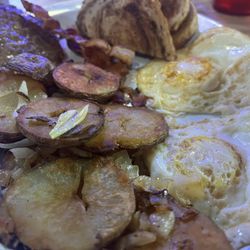 Yellow Dog Cafe & Bar - Two eggs, fried potato, sausage, bacon, rye, toast.