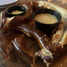 Bavarian Pretzel With cheese dip and mustard Bavarian Pretzel With cheese dip and mustard