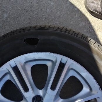Saferoad Roadside Assistance - There is big hole on the tire. - Roadside Assistance Near Me Saferoad Roadside Assistance - There is big hole on the tire. - Roadside Assistance Near Me