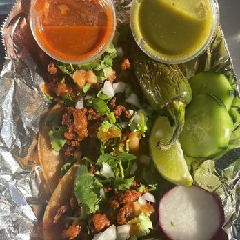 Pink Taco KC - a plate of tacos and salsa - Food Trucks Near Me Pink Taco KC - a plate of tacos and salsa - Food Trucks Near Me