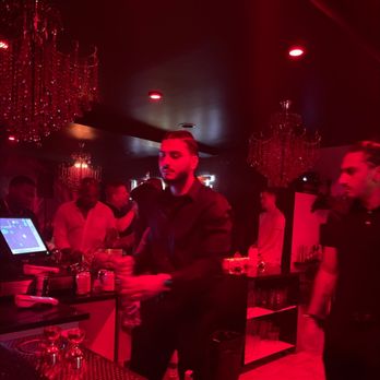 Savanna Lounge - a man standing at a bar with a laptop - Lounges Near Me - Ottawa, Ontario Savanna Lounge - a man standing at a bar with a laptop - Lounges Near Me - Ottawa, Ontario