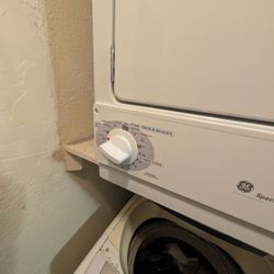 Christie's Appliance - Dryer, again not centered or in alignment with shelf _ This is not an installation, it's throw the fucking dryer in the corner and run!