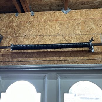 R & E Garage Doors - after (replaced with a happy face) - Garage Door Services Near Me