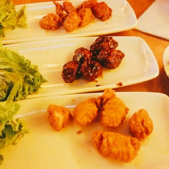 Pub 56 - Mango habanero, blackberry honey mustard, and garlic parm boneless wings. Mostly flavorless, tiny, and poor plating. - American Near Me - Aurora, Illinois Pub 56 - Mango habanero, blackberry honey mustard, and garlic parm boneless wings. Mostly flavorless, tiny, and poor plating. - American Near Me - Aurora, Illinois