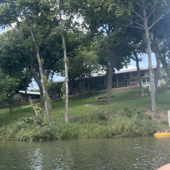 Horseshoe Riverside Lodge - Water view of hotel - Hotels Near Me - Canyon Lake, Texas Horseshoe Riverside Lodge - Water view of hotel - Hotels Near Me - Canyon Lake, Texas