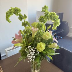 Kathleen's Designs By The Flower Girl - Stunning green bouquet with hints of pink. Just what I wanted! And the lilies will continue to open and get even more gorgeous