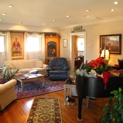 Belhaven Water Street Bed & Breakfast - Living Room with Baby Grand piano, you're welcome to tickle the ivory!