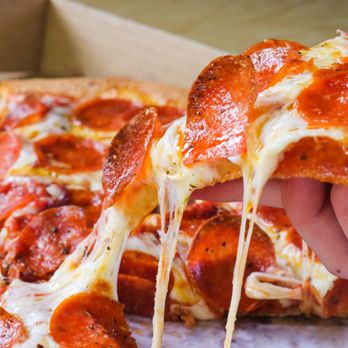 6 Guys Pizza Pies - a hand holding a slice of pizza - Pizza Near Me - Fort Pierce, Florida 6 Guys Pizza Pies - a hand holding a slice of pizza - Pizza Near Me - Fort Pierce, Florida