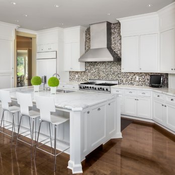 Life Construction and Design - a kitchen with a center island - General Contractors Near Me - Troy, Michigan