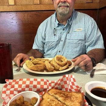 Honey Hole Cafe - My husband grinning about his catfish filets. He says he's coming back for the plate size chicken fried steak! - American Near Me - Marshall, Texas