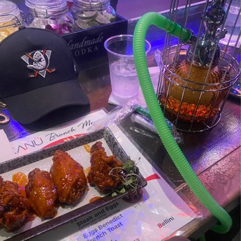 Kanu Bar Grill - Sweet Chili Wings paired with ice water and blueberry mint hookah - Bars Near Me - New York, New York Kanu Bar Grill - Sweet Chili Wings paired with ice water and blueberry mint hookah - Bars Near Me - New York, New York