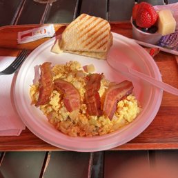 Farmer's Breakfast with 2 strips of bacon cut in half, one piece of toast, and flavorless fruit cup 18.99 Farmer's Breakfast with 2 strips of bacon cut in half, one piece of toast, and flavorless fruit cup 18.99