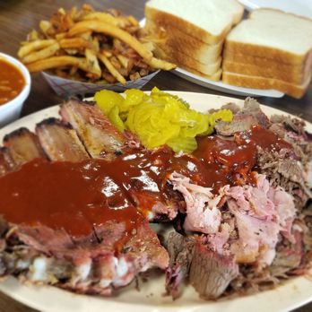 Bates City BBQ - Combo Tray with pork spareribs, sliced brisket & ham, bread, pickles plus an extra side of crunchy, delicious fries! - Barbeque Near Me - Bates City, Missouri Bates City BBQ - Combo Tray with pork spareribs, sliced brisket & ham, bread, pickles plus an extra side of crunchy, delicious fries! - Barbeque Near Me - Bates City, Missouri