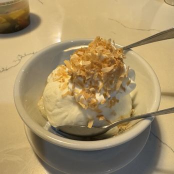 Thailicious27 - Coconut ice cream with warm sticky rice - crispy sweet coconut flake sprinkled on top yummy! - Thai Near Me - Davenport, Florida Thailicious27 - Coconut ice cream with warm sticky rice - crispy sweet coconut flake sprinkled on top yummy! - Thai Near Me - Davenport, Florida