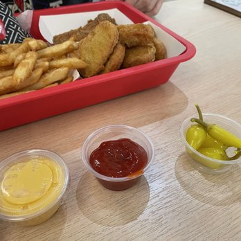 Wallace Chicken - Sauces and banana pepper - Chicken Wings Near Me - Walnut, California Wallace Chicken - Sauces and banana pepper - Chicken Wings Near Me - Walnut, California