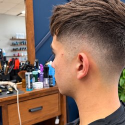 AZ Barbershop - Clean fade with a sharp, polished finish.