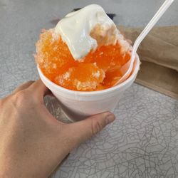Frosties Rail Stop - Orange shaved ice with ice cream