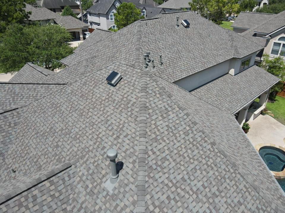 Slide of Core Four Roofing