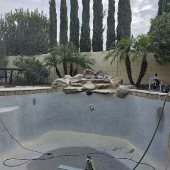Dolphin Pool Maintenance - Water feature before calcium removal - Pool Cleaners Near Me - Mesa, Arizona