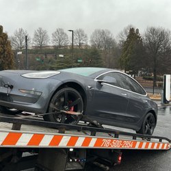 Wheels Up Towing - Tesla being dropped off to the dealership today.