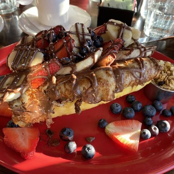 Fiesta Cafe - The wild yogurt pineapple, yogurt substituted with banana crapes. - Breakfast & Brunch Near Me - Milwaukee, Wisconsin