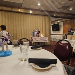 Pizza King - Party room behind the curtain. Had to walk through someone else's party to get here.