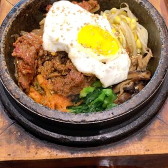 Burning Rice - Hot Stone Bowl w/ Spicy Bulgogi and Kimchi Rice - Korean Near Me - Frisco, Texas Burning Rice - Hot Stone Bowl w/ Spicy Bulgogi and Kimchi Rice - Korean Near Me - Frisco, Texas
