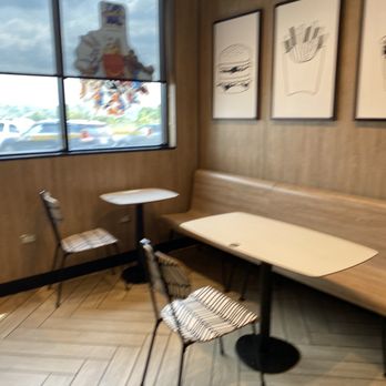 McDonald's - a table and chairs in a restaurant - Fast Food Near Me - Sanders, Kentucky