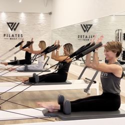 Pilates West - Working on a tall, seated posture using the whole core! *with the bonus of a hamstring stretch and bicep pull.